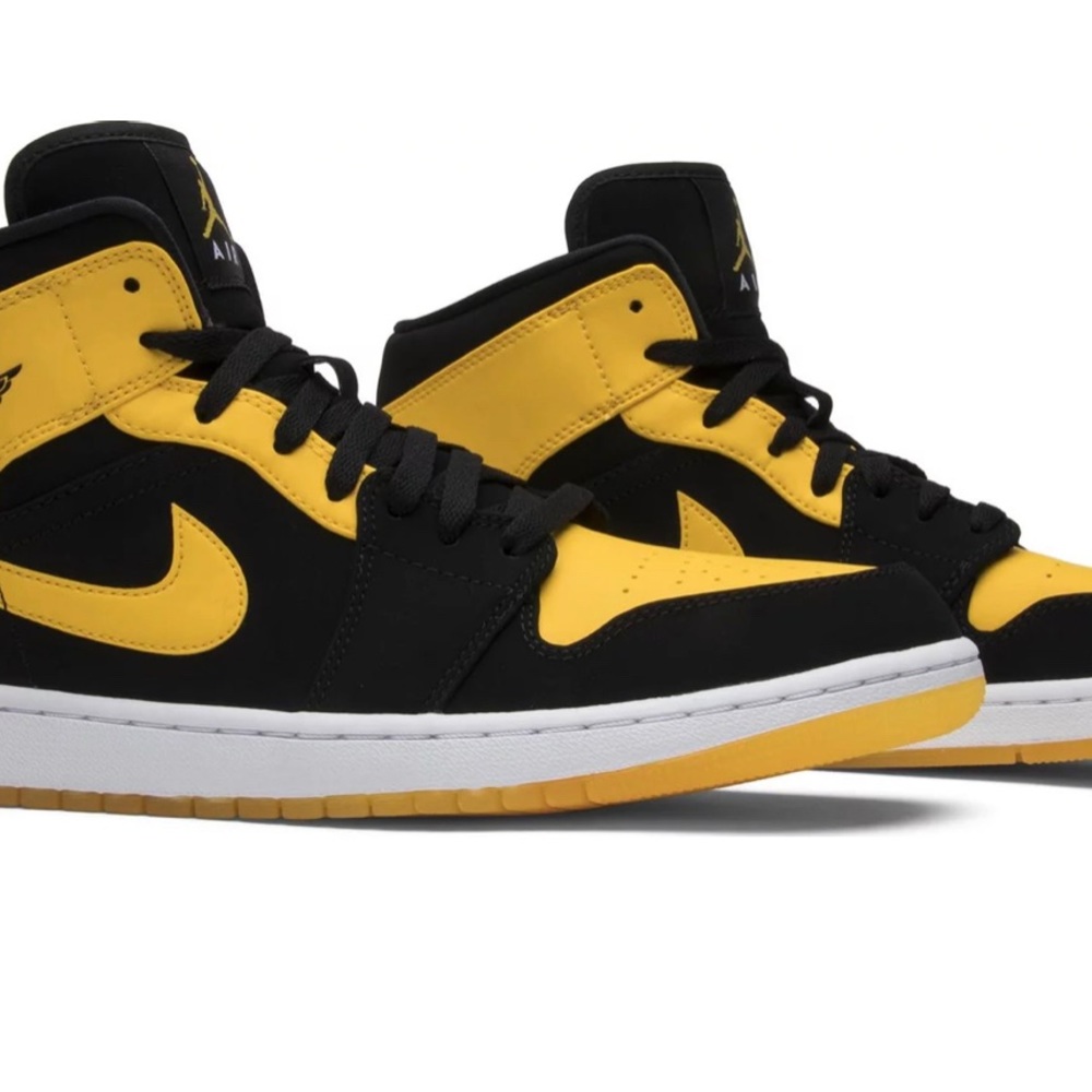 Black and yellow suede Air Jordan 1 Retro